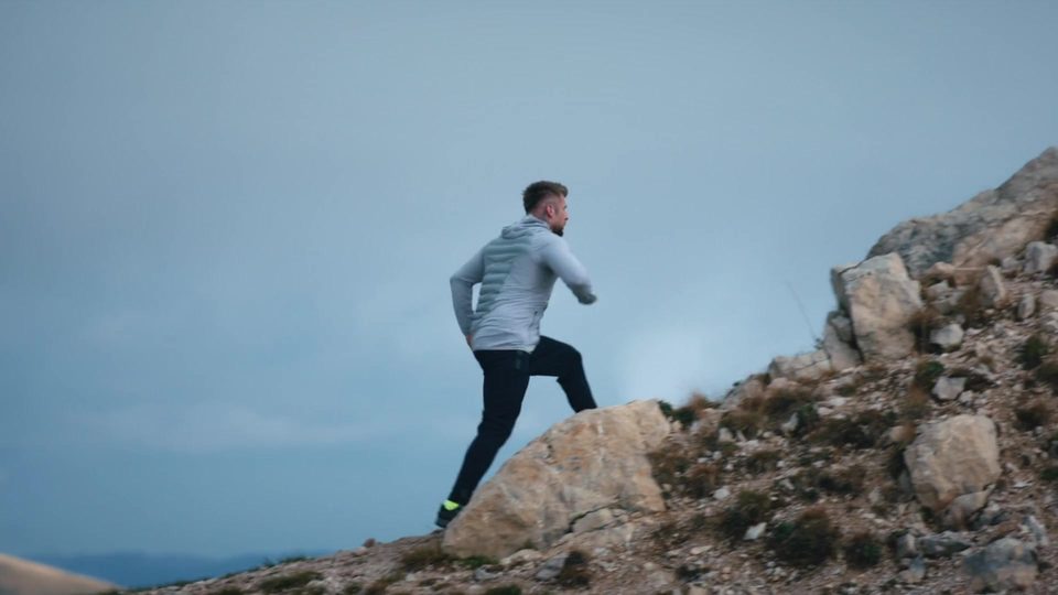 Runner on a mountain ridge, from the Gym Aesthetics campaign